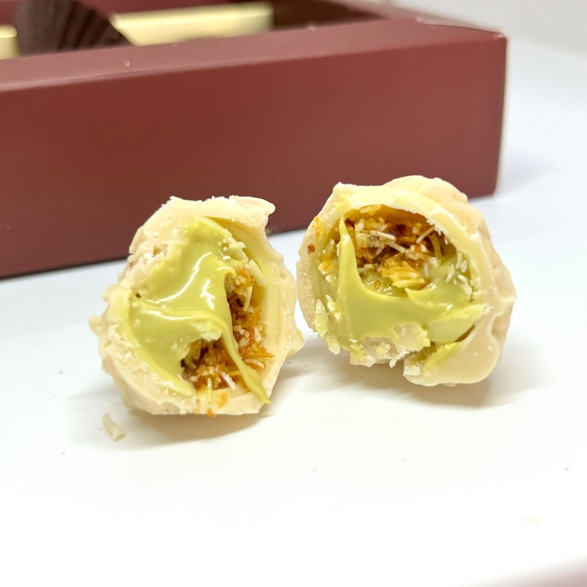 Ema Chocolate Milk and White Chocolate Truffles With Dubai Filling - Merry Christmas Box - 250g - TryAladdin