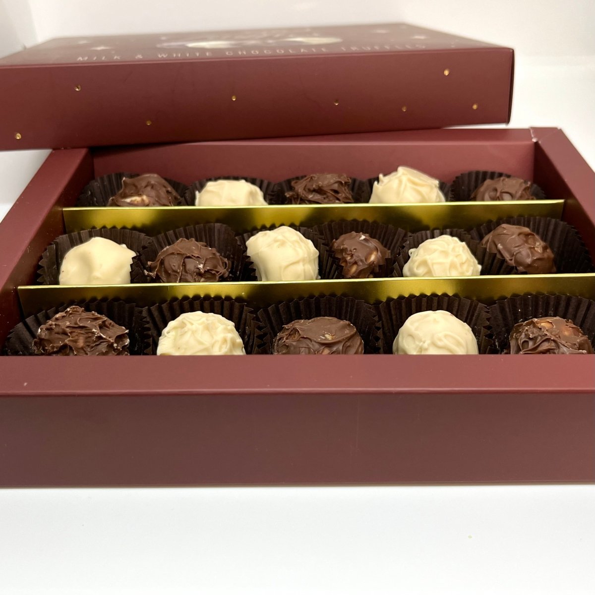 Ema Chocolate Milk and White Chocolate Truffles With Hazelnut Cream - 250g - TryAladdin