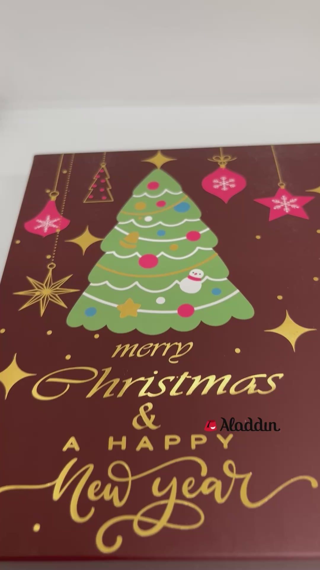 شوكولاتة إيما بالحليب وكرات الشوكولاتة البيضاء المحشوة بالفراولة - علبة عيد ميلاد مجيد - 250غ